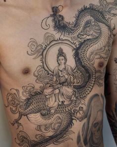 a man with a dragon tattoo on his chest