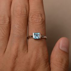 This is a gorgeous handmade creation. Its beauty is its simplicity & Elegance. The 6*6 mm Square cut swiss blue topaz(about 1.24ct) is crafted in solid sterling silver or 14k white/rose/yellow gold All item is sent in a beautiful gift box If you have any idea of design your ring,pls contact me directly. You can realize more lovely stuff clicking the link https://www.etsy.com/shop/knightjewelry?refshopsection_shophome_leftnav Please leave the correct address and you phone number for deliverin Swiss Blue Topaz Ring, Ring White Gold, Etsy Wedding Rings, Jewelry Wedding Rings, Rose Yellow, Swiss Blue Topaz, Square Cut, Jewelry Wedding, Blue Topaz Ring