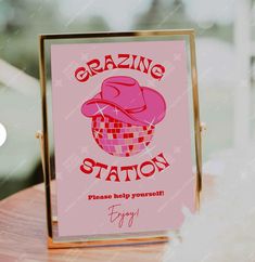 a pink sign that says grating station on it