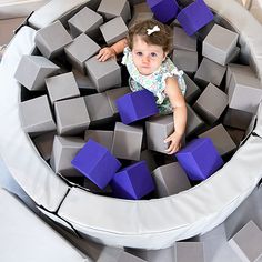 Our MINI foam cubes are the perfect fit for our baby foam pit. They allow toddlers to let go of fear and climb in! Foam pits are great fun and offer year round entertainment! They have therapeutic multi-sensory benefits that provide deep pressure sensation, tactile stimulation and relaxation. Available in one size and ten colors. Comes in pack of 150 cubes We recommend supervising your toddler while in the foam pit. The mini foam pit is sold separately. TIP: Read our blog 'Your foam pit question Playroom Idea, Foam Pit, No Sleep Till Brooklyn, Let Go Of Fear, Playroom Flooring, Baby Rock, Deep Pressure, Modern Playroom, Daycare Decor