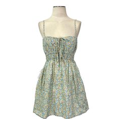 Faithfull The Brand- Shivka Mini Dress In Sabinosa Floral Print Size Xs (2). Adjustable Straps. 100% Linen. White Background With Yellow And Aqua Ditzy Floral Print. Fully Lined. Keyhole And Tie Detail At The Neckline. Elasticized Waist. Shoulder-Bottom Measures About 32.5” Long. Armpit-Armpit Measures About 11” Across Laid Flat (Plus Elastic Stretch). Waist Measures About 11.25” Across Laid Flat (Plus Elastic Stretch). Original Tag Attached From The Boutique. No Holes, Stains, Tears. New Condit Yellow Floral Sundress For The Beach, Yellow Floral Sundress For Beach, Yellow Sundress With Ditsy Floral Print, Yellow Ditsy Floral Print Mini Dress For Spring, Yellow Mini Dress With Ditsy Floral Print For Spring, Yellow Ditsy Floral Print Sundress, Yellow Ditsy Floral Print Dress For Vacation, Yellow Ditsy Floral Mini Dress For Spring, Yellow Ditsy Floral Sundress