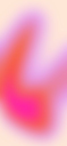 an abstract blurry background in pink and orange