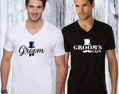 two men standing next to each other wearing t - shirts that say grooms crew