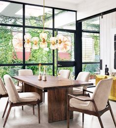 a dining collection constructed from metal and wood paired with a modern glam gold chandelier Burke Decor, Dining Arm Chair, Modern Dining Room, Dining Room Design, Upholstered Dining Chairs, Dining Room Sets, Design Case, Room Table, Modern Dining