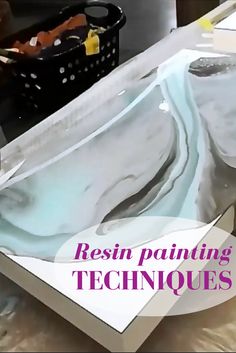 a sink that has been painted with acrylic paint and the words resinin painting techniques