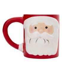 a red and white coffee mug with a santa clause on it's face in front of a white background