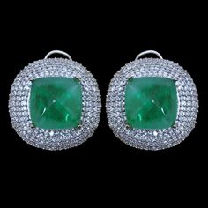 Emerald Doublet Earrings features semi precious green stone and cz diamonds in round shape. Ideal to pair with your design outfits and bridal wedding gown. These LUXURY Statement Green Pariba Tourmaline Earrings surely elevate your look. Perfect Gift For her. *𝐏𝐑𝐎𝐃𝐔𝐂𝐓 𝐃𝐄𝐓𝐀𝐈𝐋* * 𝐌𝐚𝐭𝐞𝐫𝐢𝐚𝐥: Brass * 𝐏𝐥𝐚𝐭𝐢𝐧𝐠: White Rhodium Plated * 𝐒𝐭𝐨𝐧𝐞: AAA-quality CZ Diamond & Emerald Doublet. *𝐃𝐈𝐌𝐄𝐍𝐒𝐈𝐎𝐍𝐒* * 𝐖𝐞𝐢𝐠𝐡𝐭: 11 gm each * 𝐋𝐞𝐧𝐠𝐭𝐡: 1.1 I Inches * 𝐖𝐢𝐝𝐭 Green Hand-set Diamond Earrings, Green Hand Set Diamond Earrings, Green Gemstone Diamond Earrings, Green Cubic Zirconia Diamond Drop Earrings, Green Diamond Earrings For Parties, Fine Jewelry Green Diamond Earrings, Green Round Earrings With Pave Setting, Green Diamond Earrings With Diamond Accents, Green Hand-set Diamond Earrings As Gift