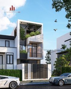 two cars are parked in front of some white buildings with plants on the balconies