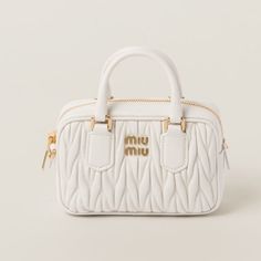 Miu Miu Arcadi Matelasse Leather Mini Bag White Height: 10.3 Cm Width: 15.3 Cm Depth: 4.5 Cm Luxury White Pouch Box Bag, Modern Miu Miu Satchel Bag, Modern Miu Miu Double Handle Bag, Miu Miu Evening Shoulder Bag With Top Carry Handle, Modern Miu Miu Bags For Daily Use, Modern Miu Miu Top Handle Shoulder Bag, Luxury Miu Miu Shoulder Bag With Top Carry Handle, Miu Miu Evening Bags With Top Carry Handle, Modern Miu Miu Bags With Detachable Handle