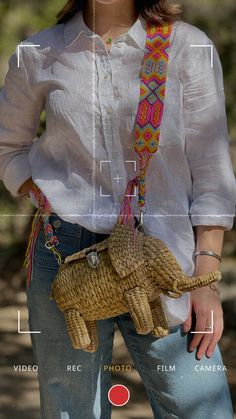 Get ready to illuminate your style with this Elephant Bag, a one-of-a-kind raffia handbag that exudes boho charm. Expertly hand-woven from premium Iraca palm in Mexico, this captivating whicker animal bag stands out as not just a novelty purse but a testament to unique craftsmanship. Serving as a high point of any outfit, this Mexican woven bag is the epitome of whimsical elegance. Doubling as a straw crossbody bag, it features a meticulously handwoven strap from Chiapas, adorned with a matching Shaped Purses, Raffia Handbag, Bohemian Handbags, Wool Knit Scarf, Straw Crossbody Bag, Elephant Bag, Boho Chic Bags, Novelty Purses, Handcrafted Boots