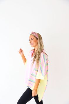 If you're someone who is ready for leggings weather but not sweaters quite yet, this FUN oversized top will check those boxes for you! Featuring colorblocking and blocks of stripes throughout the top Also features a high/low cut & a collar detail Model is 5’4” wearing a size small Runs oversized Multicolor Tops With Contrast Stripes For Spring, Oversized Tops With Striped Hem For Spring, Spring Striped Collar Top For Loungewear, Spring Loungewear Top With Striped Collar, Spring Oversized Top With Striped Hem, Oversized Striped Hem Tops For Spring, Oversized Spring Top With Striped Hem, Playful Color Block Tops For Spring, Spring Color Block Lounge Tops