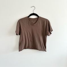 Brandy Melville Brown Chloe Short Sleeve Tshirt Size: One Size Brand New With The Tag Brown Cotton V-neck Shirt, Brown Cotton V-neck Top, Brandy Melville Shirts, Tops Brandy Melville, Brown Tee, Paris Shirt, Brandy Melville Top, Brandy Melville Shorts, Plain White Tee