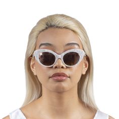 Roberi & Fraud’s retro-futurist sunglasses have quickly emerged as vital of-the-moment women’s accessories, making a strong case for the bygone decade’s return to aesthetic relevancy. Founded in 2017, it is the brainchild of self-taught New York/Dubai-based designers Ali Mehrdad and Stefan Foster. Pearlized acetate frame sunglasses. Tonal lenses with 100% UV protection. Size: 38.21 145. Acetate. Imported. Classic Sunglasses For Spring Party, Retro Clear Sunglasses For Party, Retro Sunglasses With Gradient Lenses For Evening, Retro Evening Sunglasses With Gradient Lenses, Retro Plastic Cat Eye Sunglasses For Party, Retro Evening Sunglasses With Uv Protection, Retro Evening Sunglasses For Summer, Retro Cat Eye Shield Sunglasses With Gradient Lenses, Clear Cat Eye Sunglasses With Uv Protection For Parties