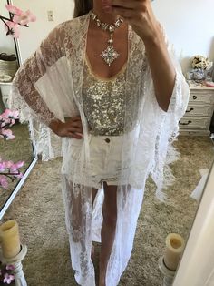 Welcome to the Suzi Rose designs shop Website: www.suzirose.com Instagram: suzi_rose_designs Design details - White lace kimono robe in a beautiful soft flowing french style lace. - Designed for a lose fit. Perfect for the bride to wear on the wedding day over a white slip (We also sell the slips separately) or perfect for any beach holiday or amazing piece to throw over an outfit for the festival seasons - Kimono comes with a white satin belt sash so you can close the robe around the waist - St Festival Open Front Cover-up, Lace Wedding Kimono With Kimono Sleeves, Lace Beachwear Cover-up For Party, White Lace Wedding Kimono, Elegant Fitted Summer Kimono, Fitted White Wedding Kimono, Summer Wedding Open Front Kimono, Bohemian Lace Cover-up For Party, Wrap Kimono For Spring Wedding