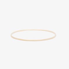 A slightly thicker version of our original gold bangle still with a dainty feel for stacking. A 1.6mm round solid 14k gold bangle.   Looking to buy 3 or more? Save with our Catch Up Pack. Solid Wire, Gold Bangle, Gold Wire, Gold Bangles, We Wear, Heavy Weight, Natural Diamonds, Bangles, White Gold