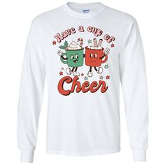 Get in the Christmas spirit with this adorable Have A Cup Of Cheer Graphic Shirt. Offered on short sleeve tee, long sleeve tee, and even a sweatshirt for those cool winter days! Pair with jeans or leggins for the cutest Christmas outfit! These are unisex fit and are true to size. Short Sleeve - 6.0 oz. pre-shrunk 100% cotton Long Sleeve - 6.0 oz. pre-shrunk 100% cotton Sweatshirt - 8 oz pre-shrunk 50% cotton/50% polyester Cute Cotton T-shirt For Winter, Pre-shrunk Long Sleeve T-shirt As A Gift, Long Sleeve Pre-shrunk T-shirt As Gift, Cute Cotton Winter T-shirt, Fun Long Sleeve Tops, Long Sleeve Graphic Tee T-shirt As Gift, Cute Long Sleeve T-shirt For Holiday, Cute Winter T-shirt With Graphic Print, Cute Winter Letter Print T-shirt