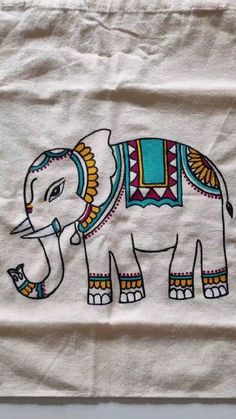 an elephant is painted on a piece of cloth