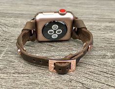 7mm Rustic Brown Genuine Leather Bracelet. Gorgeous Design Slim Leather Jewelry Tailored to Perfection. Designed And Handmade by Simeon D Jewelry Studio. This Bracelet Fits ALL Apple Watch Series. Please Measure Your Wrist Before Submitting Your Order! Not For Other Models. Apple Watch Is NOT Included. Let's be Friends! Follow my Studio on Social Media Instagram @simeondjewelry Pinterest @simeondjewelry Facebook @simeondjewelrystudio Adjustable Rose Gold Jewelry For Everyday Use, Luxury Handmade Adjustable Watch Bands, Luxury Handmade Adjustable Watch Accessories, Modern Rose Gold Watch Bands For Everyday Use, Adjustable Apple Watch Band For Everyday Use, Vintage Adjustable Apple Watch Band, Vintage Adjustable Apple Watch Band Rectangular, Rose Gold Leather Bracelet Jewelry, Adjustable Rose Gold Jewelry With Leather Strap