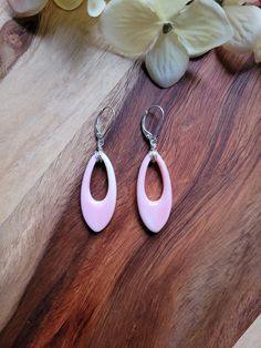 Sweet pale pink conch shell earrings.  Unique in it's soft pink hues you can have some variations of striped design or solid pink.  Available in sterling silver, gold and rose gold filled  These dangle approximately 2 inches from earlobe All hand wired with love❤ Any questions please ask! Pink Oval Feminine Jewelry, Feminine Oval Pink Jewelry, Feminine Pink Oval Jewelry, Pink Pierced Earrings As Gift, Handmade Pink Feminine Earrings, Pink Sterling Silver Earrings For Pierced Ears, Nickel-free Pink Sterling Silver Earrings, Elegant Nickel-free Pink Earrings, Elegant Pink Sterling Silver Teardrop Earrings