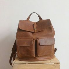 It is MADE with LOVE & PASSION It is from LEATHER It is ROOMY It is BEAUTIFUL It makes The Owner HAPPY =)  Handmade leather backpack consists of:  - Vintage Brown Backpack With Leather Lining, Brown Vintage Backpack With Leather Lining, Brown Leather Backpack With Pockets For Outdoor, Vintage Brown Leather Backpack For Adventure, Brown Vintage Leather Backpack For Adventure, Classic Leather Backpack With Pockets For Everyday Use, Brown Backpack With Pockets For Adventure, Brown Adventure Backpack With Pockets, Leather Backpack With Pockets For Adventure