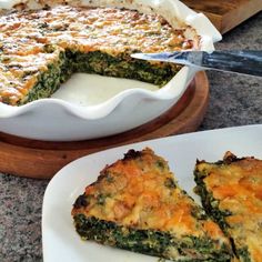 a quiche with cheese and spinach is on a plate next to another dish