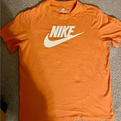 Nwot Nike T - Orange Trance. Never Worn! See Photo Of Matching Shorts - These Are Not Included But Are Listed Separately. Short Cotton Tops For Sports, Nike Casual Orange Tops, Casual Nike Orange Tops, Casual Orange Nike Tops, Nike Orange, Nike T, Nike Tops, Color Orange, See Photo