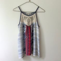 ***Brand Is Jolt*** Flowy Floral Boho Tank. Pretty Knit Crochet In Front Front Is Polyester And Back Is Rayon/Polyester Mix. Armpit To Armpit - 17” Back Length - 19” Great Condition! Never Worn. Blue Bohemian Cami Tank Top, Bohemian V-neck Camisole For Beach, Cheap Bohemian V-neck Camisole, Spring Bohemian V-neck Camisole, Halter Tank, Bohemian Stretch V-neck Tank Top, Crochet Halter, Free People Tops, Free People