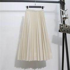 Grab this simple yet elegant Retro Slim Pleated Mid-Length Skirt For Women and expand your collection of skirts in your closet. The solid-colored skirts are available in several different colors which opens various options to buy from. The high-quality chiffon makes this skirt very light and comfortable. Elegant Full Pleated Skirt In Solid Color, Elegant Flared Mini Skirt In Solid Color, Solid Stretch Flared Skirt, Elegant White Skirt Solid Color, Elegant Relaxed Solid Color Skirt, Fitted Full Pleated Skirt In Solid Color, Elegant Relaxed Fit Solid Color Skirt, Elegant Non-stretch Pleated Flared Skirt, Elegant Non-stretch Flared Pleated Skirt