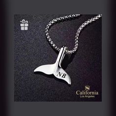 Whale Tail Pendant as a Symbol of Strength and Protection The personalized whale tail necklace symbolizes protection, embodying strength and spiritual connection to the ocean. It also represents power, wisdom, and guardianship.  The custom-engraved whale tail pendant carries its symbolism and is seen as a symbol of grace and beauty. The whale tail symbolizes protection and good luck. A whale tail pendant's meaning is all about strength and power, just like a whale's tail. The necklace is made with Rhodium-plated sterling silver, which is never tarnished. With proper care, this necklace can last many years. It is also safe for those with metal allergies. This unique whale tail necklace comes with satin bag and gift box, so your item is ready to be gifted. Classic Personalized Stainless Steel Necklaces, Stainless Steel Jewelry Suitable For Gifting, Classic Stainless Steel Jewelry For Personalized Gifts, Personalized Silver Stainless Steel Necklace, Personalized Silver Jewelry For Birthday Gift, Personalized Silver Stainless Steel Custom Necklace, Classic Pendant Custom Necklace As Gift, Silver Stainless Steel Necklace For Personalized Gift, Classic Pendant Custom Necklace For Gift