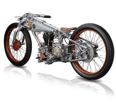 an orange and silver motorcycle is shown on a white background with its wheels still attached