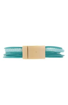 Get a layered look with this multistrand leather bracelet featuring turquoise-hued beads, sparkly crystals and a gleaming arrow secured by a magnetic clasp. 7 1/2" inner circumference Magnetic closure Leather/goldtone plate/glass Imported Golden Arrow, Arrow Bracelet, Sparkling Crystal, Layered Look, Magnetic Clasp, Multi Strand, Gold Beads, Accent Colors, Real Leather