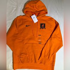 Brand New Nike Afc Richmond Orange Hoodie Ted Lasso Apple Series Fb9973-819 Men Sz: Medium. 100% Authentic With Original Tags. Any Questions Please Feel Free To Ask. Please Check My Feedback And Shop With Confidance. Cotton Sweatshirt With Adjustable Hood For Sports, Nike Hoodie With Team Logo For Winter, Nike Team-colored Hoodie For Streetwear, Nike Casual Hoodie With Team Logo, Nike Collegiate Hoodie For Streetwear, Nike Cotton Hoodie For Sports Events, Nike Cotton Hoodie For Fan Gear, Sweaters Nike, Afc Richmond