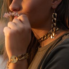 Details Look as strong as you feel in this MUSCLE Double Threat. Rock that brass and the power you possess in a matching chain necklace and bracelet that looks unbelievably gorgeous together. Items in this set include: MUSCLE Necklace 17.5" L MUSCLE Bracelet 7.5" L MUSCLE Earrings Chunky Chain Metal Necklace, Edgy Double Chain Link Jewelry, Edgy Chunky Chain Necklace, Streetwear Metal Necklace With Chunky Chain, Vintage Metal Snake Chain Necklace, Necklace And Bracelet, Triple Threat, Curb Chain, That Look