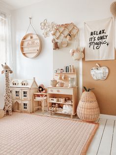 a child's playroom with toys and decor