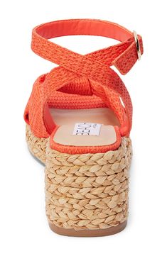 A knotted vamp accent brings modern dimension to a boho-cool sandal lifted by a raffia-wrapped platform and integrated wedge heel. 3" heel; 1" platform Adjustable ankle strap with buckle closure Cushioned footbed with arch support Synthetic upper, lining and sole Imported Ankle Shoes, Rack Room Shoes, Orange Beach, Espadrille Sandals, Platform Wedge Sandals, Sandals For Sale, Platform Wedge, Persimmon, Wedge Sandal