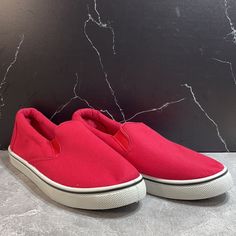 New No Box Red Slip-on Canvas Shoes For Spring, Red Slip-on Sneakers With Round Toe, Red Slip-on Canvas Shoes, Red Slip-on Canvas Shoes For Casual Wear, Red Slip-on Canvas Shoes Casual Style, Red Slip-on Canvas Shoes With Rubber Sole, Red Casual Slip-on Sneakers With Rubber Sole, Red Flat Sneakers With Rubber Sole, Red Slip-on Sneakers For Spring