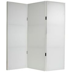 a white room divider with two doors on each side