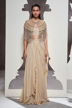 Beige foil georgette pre-draped saree with pearls and beaded embellished pallu. Comes with a blouse and a tulle mesh fringed cape. - Aza Fashions Fringe Cape, Draped Saree, Drape Saree, Band Collar, Sarees Online, Flared Sleeves, Aza Fashion, Cape, Foil