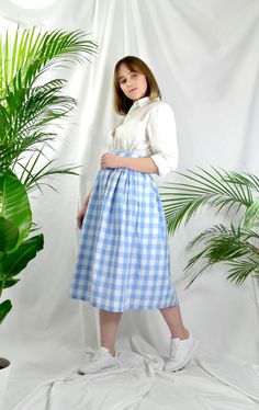 "Baby Blue check high waist full gathered skirt. Perfect for casual outfits and special ocasions with pair of trainters or high heels. 100% cotton.  Elastic at the back of waist.  Two side pockets. Midi lenght about 70cm + 5 cm waistband. Handmade in UK.  Model wears size S.  HOW TO CHOOSE A SIZE ?   Using a measuring tape, measure the smallest part of your waist.  SIZE CHART: (CM) XS - W: 66 CM S - W: 70 CM M - W: 74 CM  L - W: 78 CM  XL - W: 82 CM  CARE INSTRUCTIONS: Hand wash only, do not bleach, hang dry, do not tumble dry, press with a cool iron on the reverse side.  Please message me before purchasing so I can check availability. If you wish this skirt in any other fabric, shorter or longer \"send message to seller\" and we can try to make something especially for you. *Depends on co Polka Dots Skirt, Classic Casual Style, Fluffy Jacket, Gingham Skirt, Dot Skirt, Red Gingham, Classic Casual, Style Skirt, Gathered Skirt