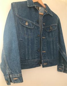 Vintage womens Lee riders denim jacket dark denim wash will fit size XS - S pockets no holes or tears thick denim button up short length in excellent vintage condition Dark Wash Denim Jacket With Snap Buttons, Retro Denim Jacket With Snap Buttons In Medium Wash, Retro Medium Wash Denim Jacket With Snap Buttons, Retro Dark Wash Denim Jacket With Button Closure, Vintage Dark Wash Denim Jacket With Pockets, Vintage Medium Wash Denim Jacket, Retro Denim Jacket With Buttons, Vintage Denim Jacket With Button Closure, Vintage Dark Wash Denim Jacket With Snap Buttons