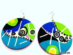 Hand Painted with acrylic paints on lightweight wood. Glossed with a clear gloss for protection.  Sterling silver Earhooks  Size 3.5in  Made by the Earring Godis Hand Painted Earrings For Festivals, Multicolor Hand Painted Earrings For Art Collection, Hand Painted Earrings For Gift And Festivals, Artistic Multicolor Jewelry With Abstract Design, Green Artistic Dangle Earrings, Green Dangle Earrings With Artistic Design, Artistic Multicolor Abstract Jewelry, Artistic Multicolor Abstract Design Jewelry, Artsy Hand Painted Dangle Earrings