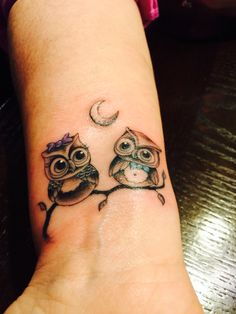 two owls sitting on a branch with the moon in the sky behind them tattoo design