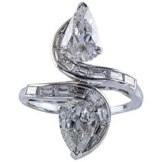 1950s GIA Certified Double Pear Shape Diamond Platinum Ring | From a unique collection of vintage fashion rings at https://www.1stdibs.com/jewelry/rings/fashion-rings/ Pear-shaped Single Cut Diamond Ring In Diamond White, Gia Certified Teardrop Diamond White Diamond Ring, Gia Certified Pear Diamond Ring, Gia Certified Silver Pear-shaped Diamond Ring, Gia Certified Pear-shaped Diamond Ring, Gia Certified Pear-shaped Silver Diamond Ring, Platinum Diamond Ring With Pear-shaped Accents, Vvs Clarity Pear-shaped Platinum Diamond Ring, Platinum Diamond Ring With Vvs Clarity, Pear-shaped