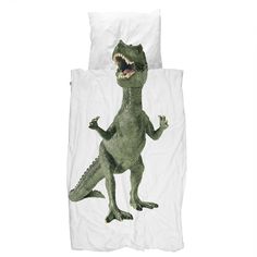 a bed with an image of a dinosaur on it