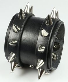 Cheap Punk Bracelets For Halloween, Cheap Edgy Wristband For Concerts, Cheap Gothic Spiked Jewelry, Cheap Spiked Jewelry For Concerts, Cheap Halloween Punk Bracelets, Cheap Silver Punk Wristband, Cheap Punk Wristband For Concerts, Spiky Bracelet Spikes, Spikey Bracelets