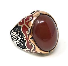 -Stone Type: Natural Red Agate (aka Aqeeq) -Stone Dimensions: 2.1 cm x 1.5 cm -Metal Type: Sterling Silver(925k) & Bronze Details (Yellow Part) -Weight of the Item: 17gr (Approx.) All items comes in a special gift box. If you don't see your size, please ask, we may produce your size. You are looking at the high quality handcrafted silver ring. All of our items have been designed and produced by ourselves ,so all our items comes with 1 year warranty as well. International shipping(customers f Red Oval Enamel Ring For Gift, Oval Red Enamel Ring For Gift, Red Inlay Rings For Gifts, Red Gemstone Enamel Ring Gift, Red Enamel Gemstone Ring For Gift, Red Enamel Ring With Gemstone Gift, Red Carnelian Signet Ring For Anniversary, Red Cabochon Signet Ring Gift, Collectible Red Carnelian Ring