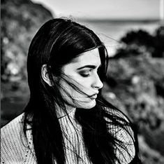 black and white photograph of a woman with long hair