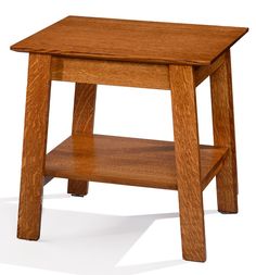 a small wooden table sitting on top of a white floor