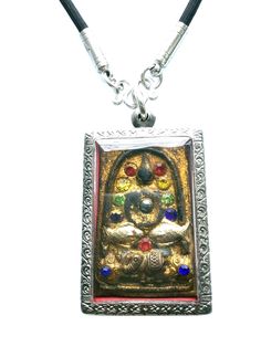 This is a perfect and unique style talisman magic pendant made of mixed magic metal, gemstone, leklai and gold, the power of the pendant is to protect all dangers and ghost, evil, devil, and help bring good luck and wealth to the owner, The item showcases an elegant design with rare amulet style. It is great to get this item for your loved one or treat yourself for a classic timeless style.  Amulet Size: 4 x 5.5 cm.,  Stone Type: Many Colors of Gemstone, Leklai Metal Type: Stainless, brass and g Spiritual Silver Jeweled Necklaces, Spiritual Rectangular Jewelry For Rituals, Rectangular Spiritual Jewelry For Rituals, Spiritual Rectangular Pendant Jewelry For Collectors, Collectible Spiritual Jewelry With Rectangular Pendant, Spiritual Collectible Rectangular Pendant Jewelry, Collectible Spiritual Rectangular Jewelry, Rectangular Spiritual Good Luck Jewelry, Spiritual Rectangular Good Luck Jewelry