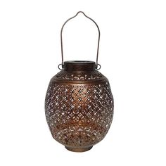 an ornate metal lantern with handle on white background